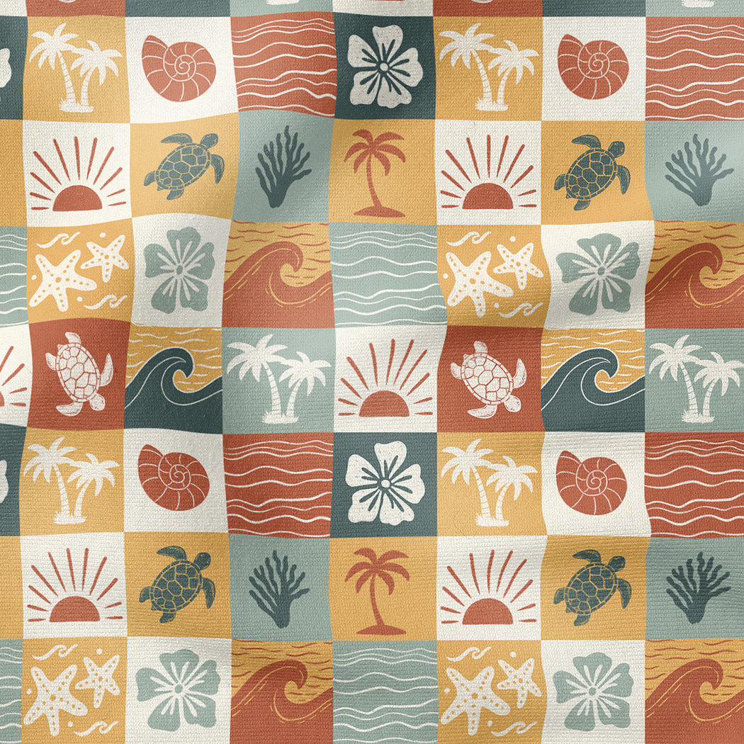 Patterned fabric with tropical designs including palm trees, turtles, and suns on a checkered background.