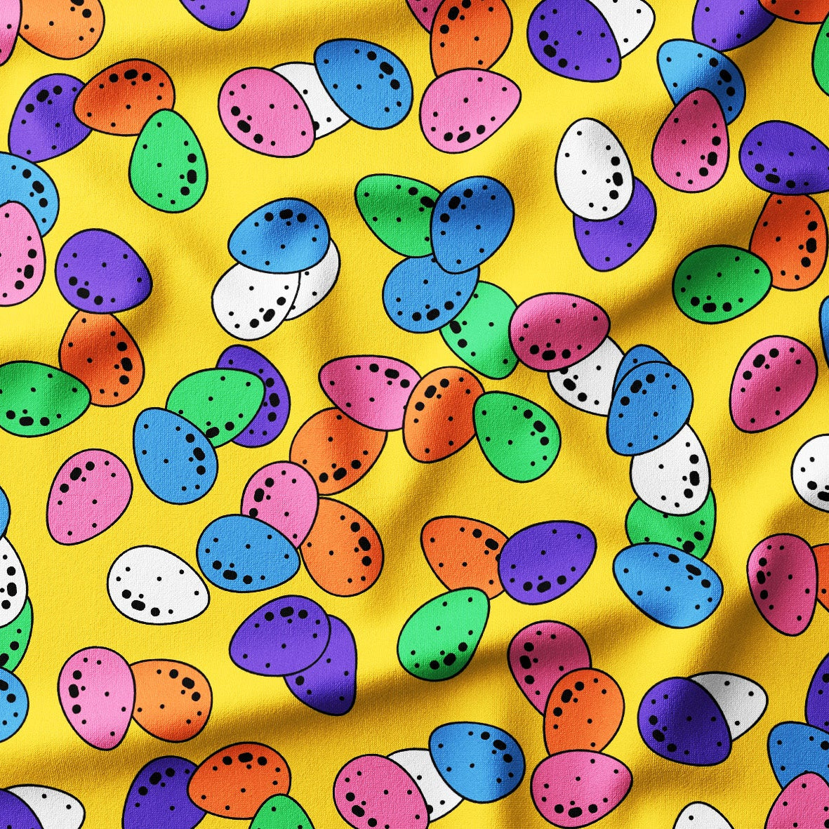 Colorful pattern of multicolored eggs on a yellow fabric background