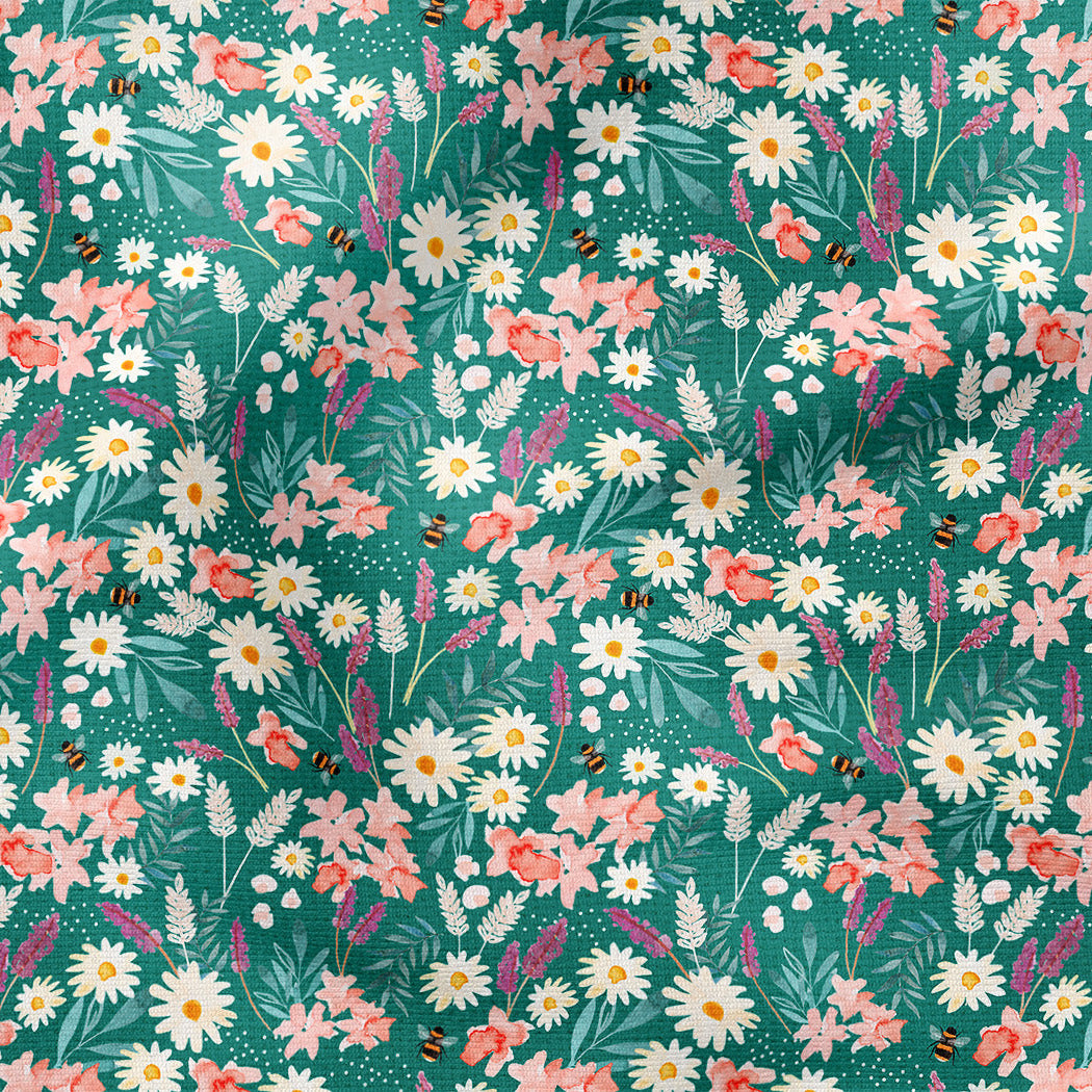 A close-up of a fabric or wallpaper pattern featuring a dense floral print on a dark teal-green background. The design includes white daisies with yellow centers, pink and peach blossoms, and green leaves, interspersed with small yellow and black bumblebees.