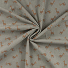 Giraffe pattern jersey fabric in khaki