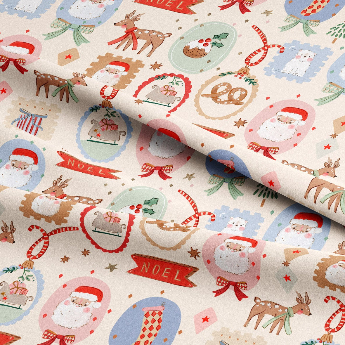 A close-up of festive Christmas-themed fabric with a cream background and a repeating pattern of Santa Claus, reindeer, ornaments, candy canes, and red 'NOEL' banners, with one corner folded over.