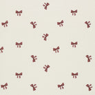 Cream fabric with Bordeaux bow tie print