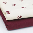 Bordeaux bow tie patterned fabric