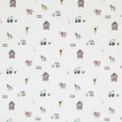 Farm scene textile with barns, animals, and sunflowers