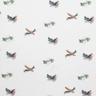 Patterned fabric with toy airplane illustrations