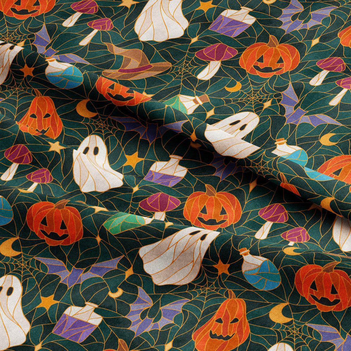 Halloween-themed fabric with a repeating pattern of orange jack-o'-lanterns, white ghosts, purple mushrooms, green bottles, yellow stars, and bats on a dark teal background.