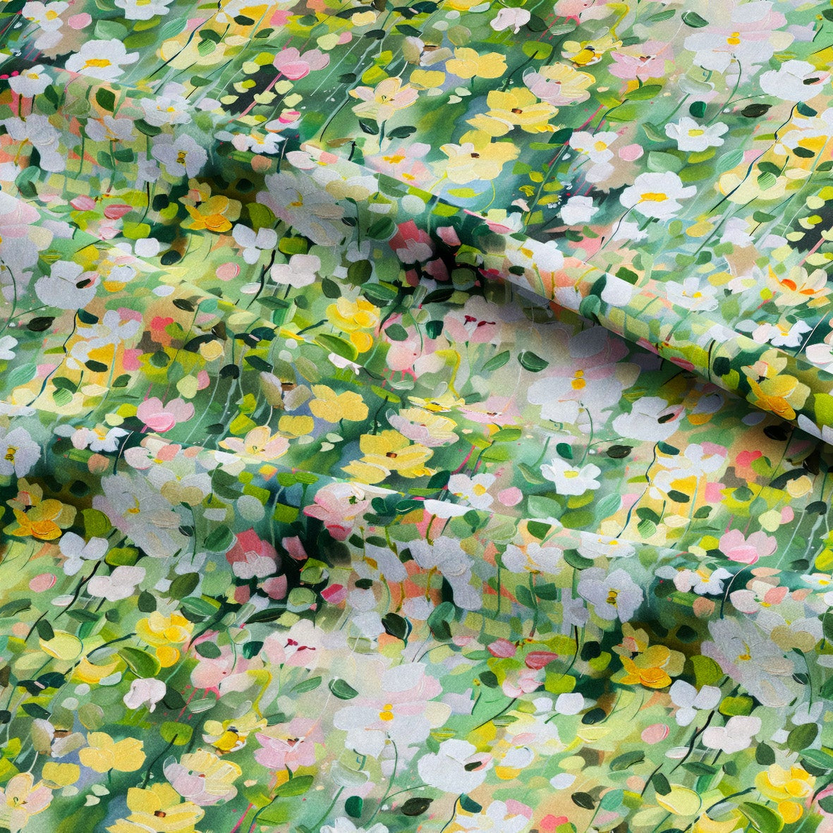 Floral fabric with a pattern of small flowers in green, yellow, and pink on a green background.