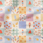 Summer patchwork fabric with ice cream, cherries, lemons, and rainbows