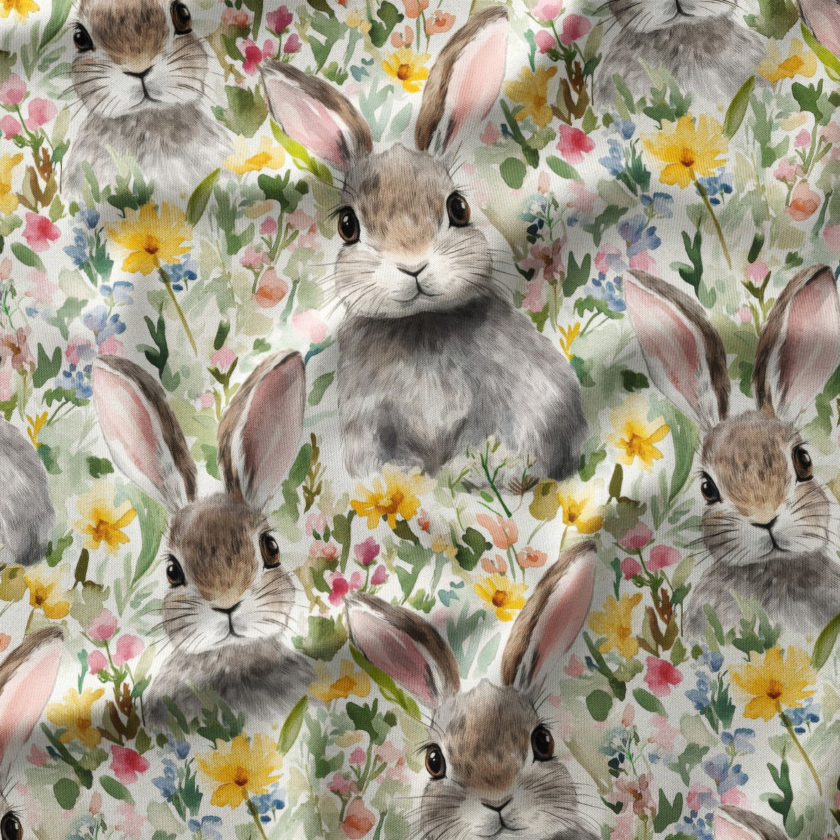 Pattern of rabbits and flowers on a fabric background