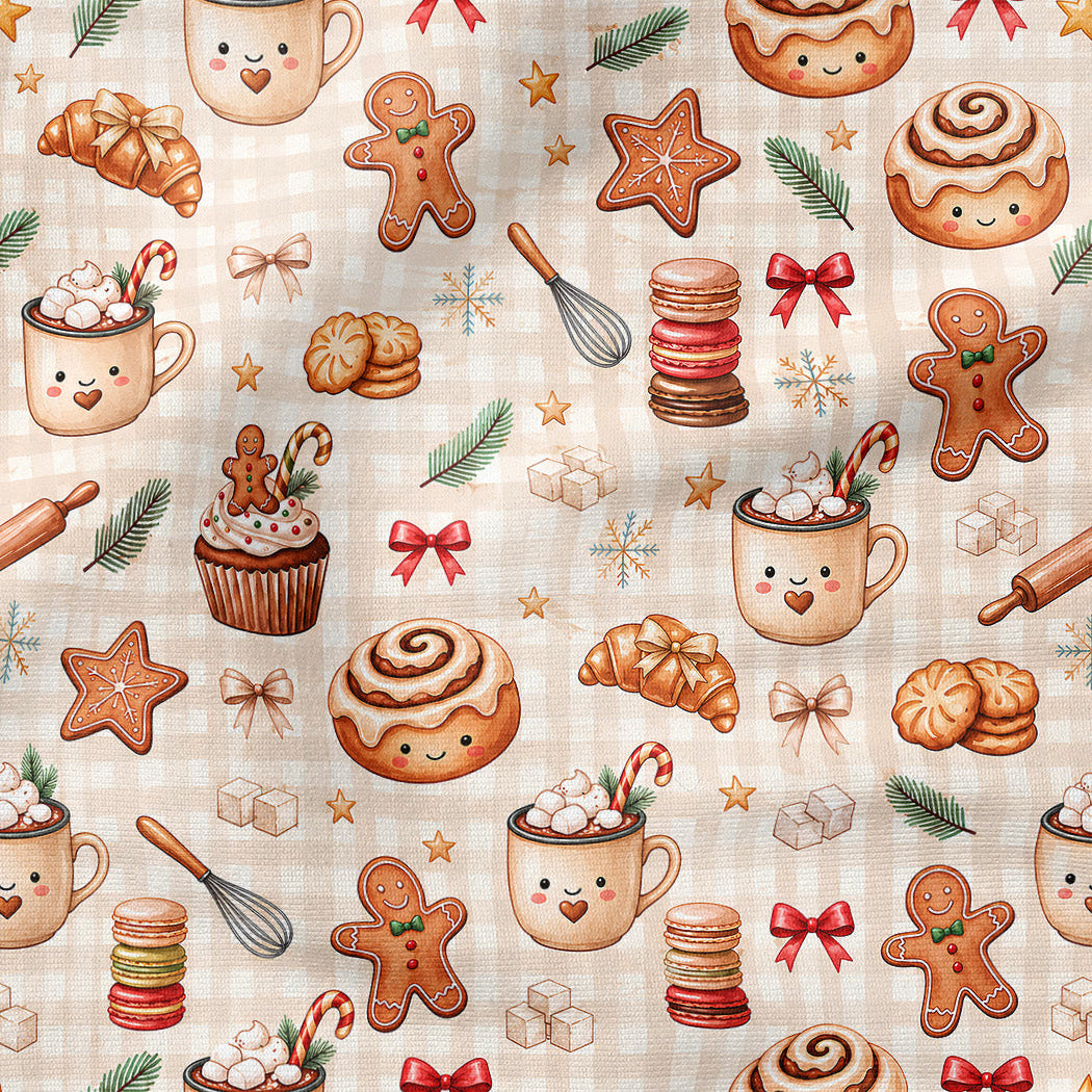 A repeating holiday-themed pattern featuring cute illustrated gingerbread men, cinnamon rolls, cupcakes, hot cocoa mugs with whipped cream and candy canes, stars, bows, and small evergreen branches on a light beige plaid background.