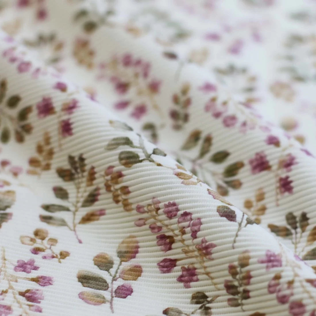 https://www.jellyfabrics.co.uk/cdn/shop/products/Ottoman-Rib-Jersey-Leaves-Old-Mauve.webp?v=1655048949&width=1100
